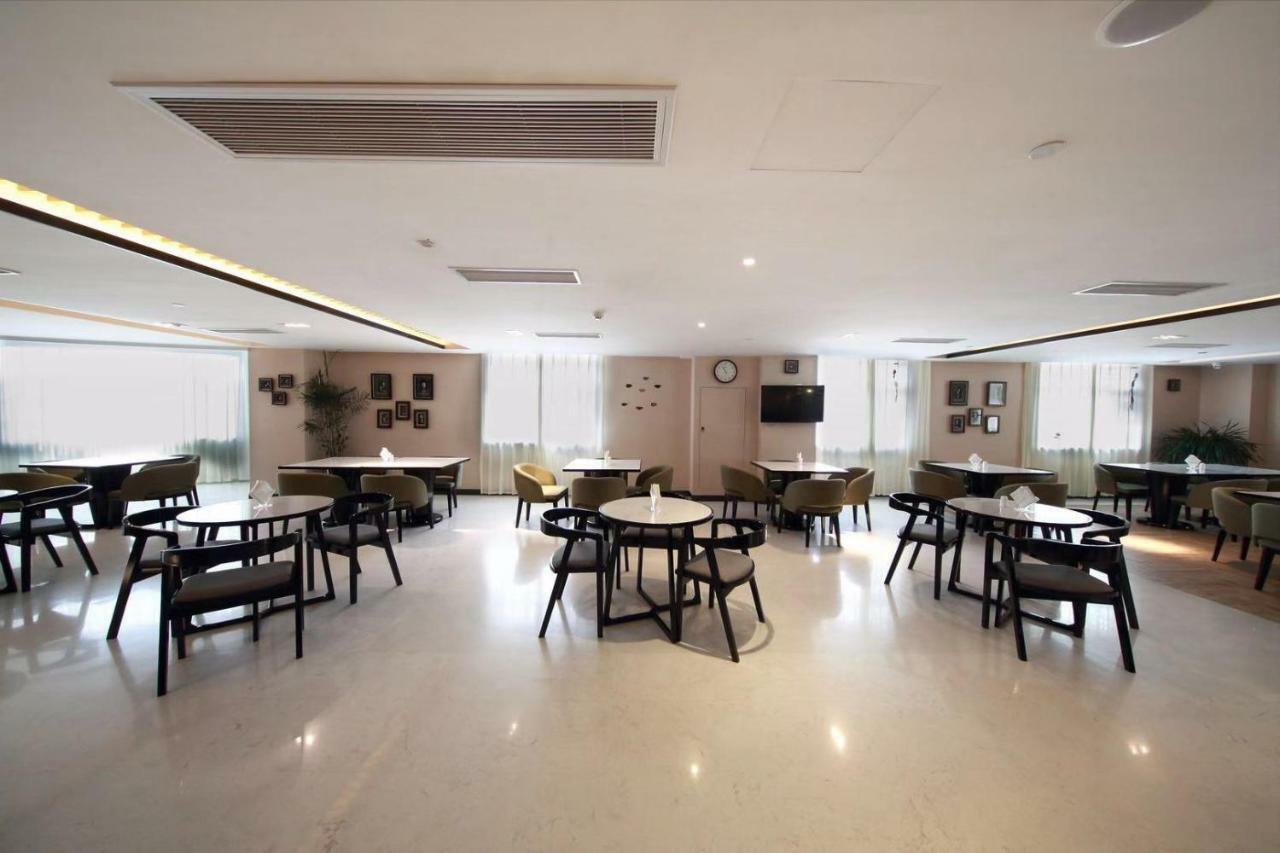 锦江都城酒店海南省政府日月广场免税店 Haikou  Exteriör bild